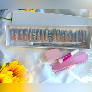 Elegant Blue & Nude Press-On Nails with Floral and Rhinestone Accents